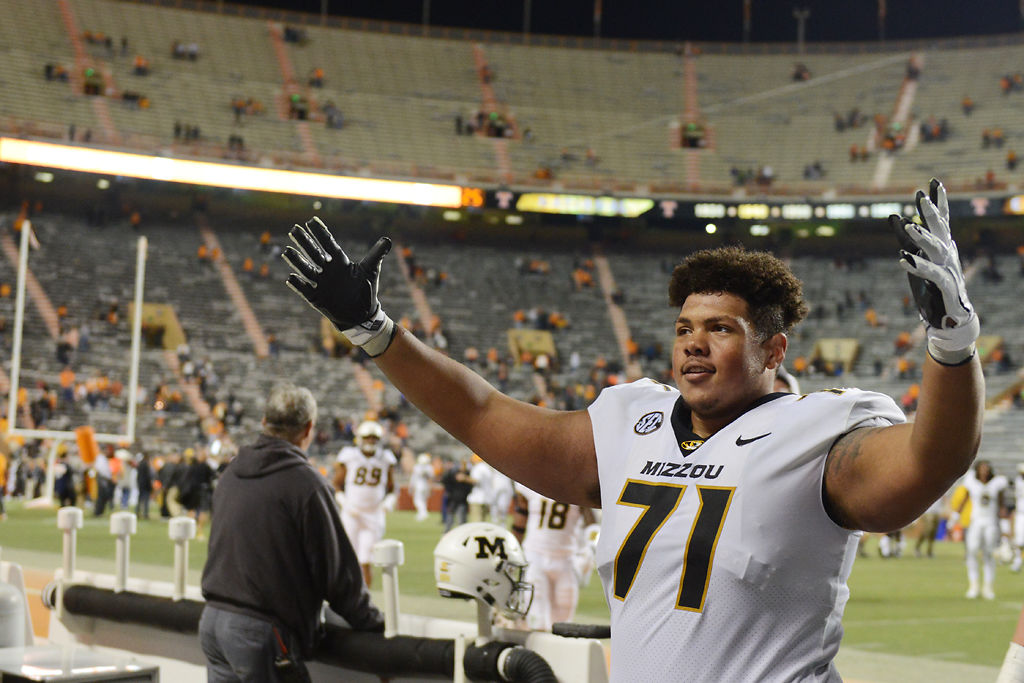 Missouri offensive lineman Kevin Pendleton looks to the Tigers crowd